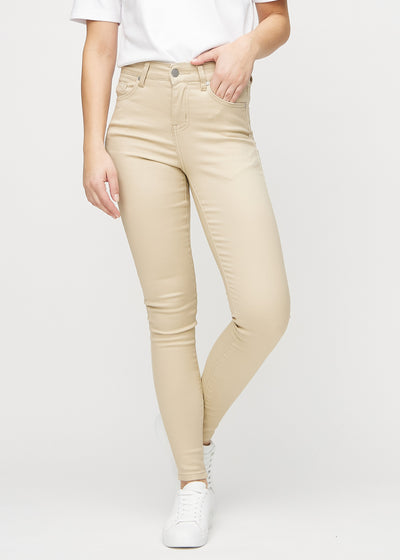 Beige skinny jeans, modelnavn Gazelles, som sidder tæt til benet, set forfra.