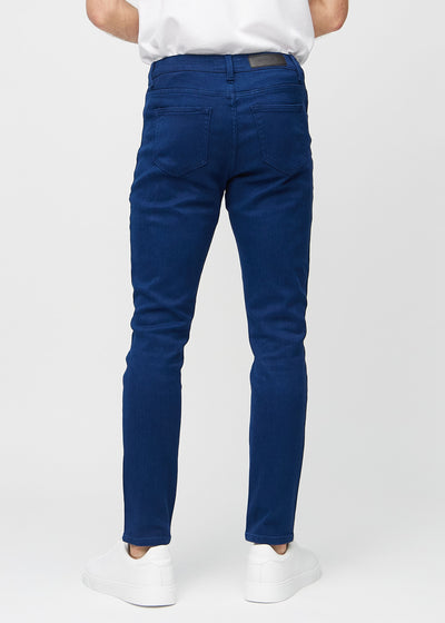 Mørkeblå slim jeans set bagfra, så man kan se hele produktet.